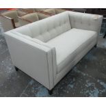 SOFA, two seater, in grey buttoned fabric on square supports, 166cm L.