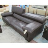 ROCHE BOBOIS SOFA, two seater, in tanned leather on block supports, 243cm L.