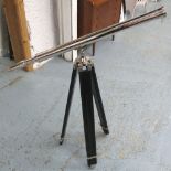 TELESCOPE, polished metal, ebonised tripod base.