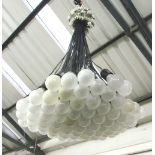 CHANDELIER, by Rody Graumans, for Droog, 1993, eighty five lamps, retails in excess of £2000,