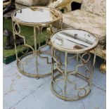 MIRRORED OCCASIONAL TABLES, a graduated pair, on a metal base, largest 46cm diam. x 55cm H.