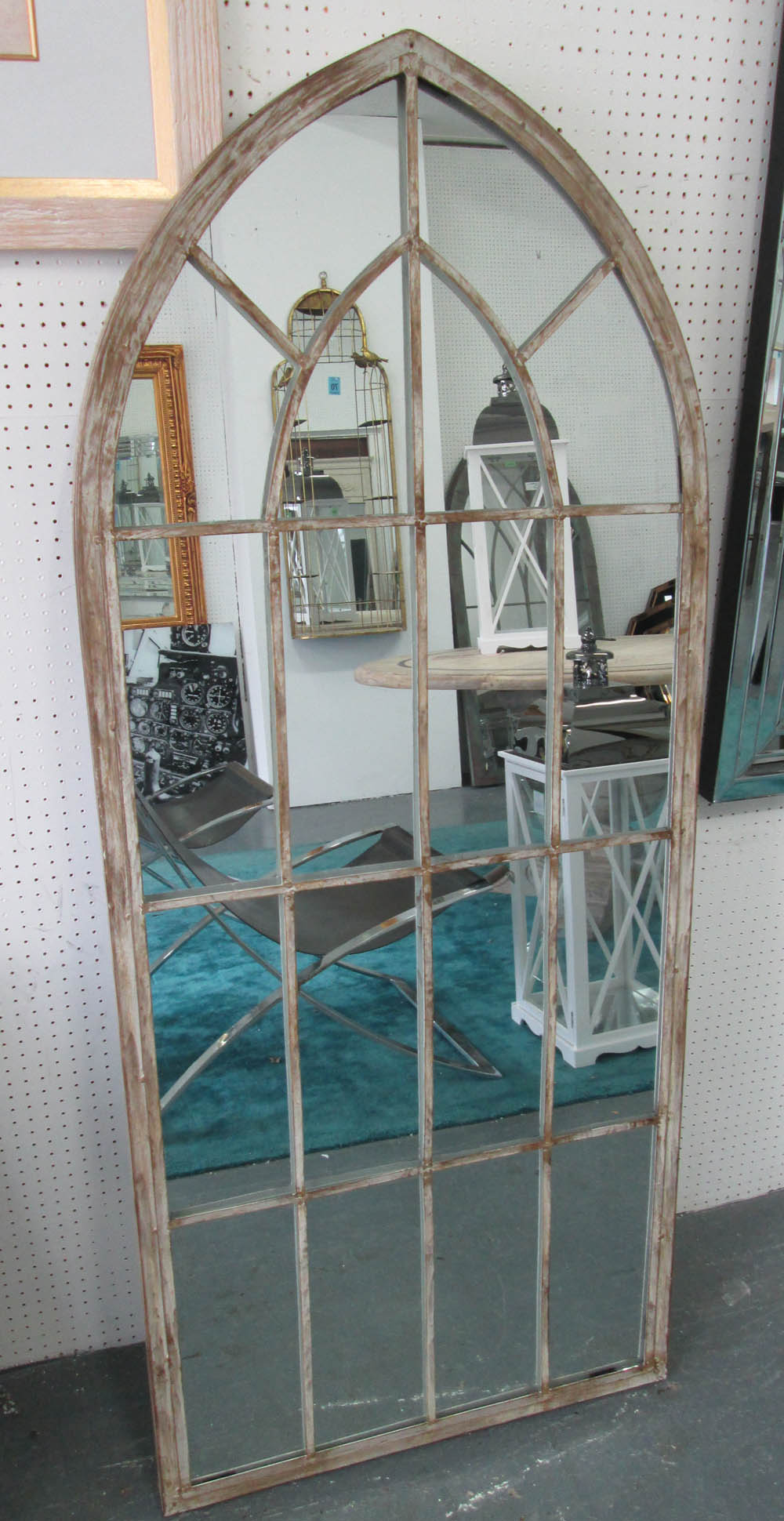 ARCHITECTURAL GARDEN MIRRORS, a pair, gothic style, in distressed effect painted metal frames,