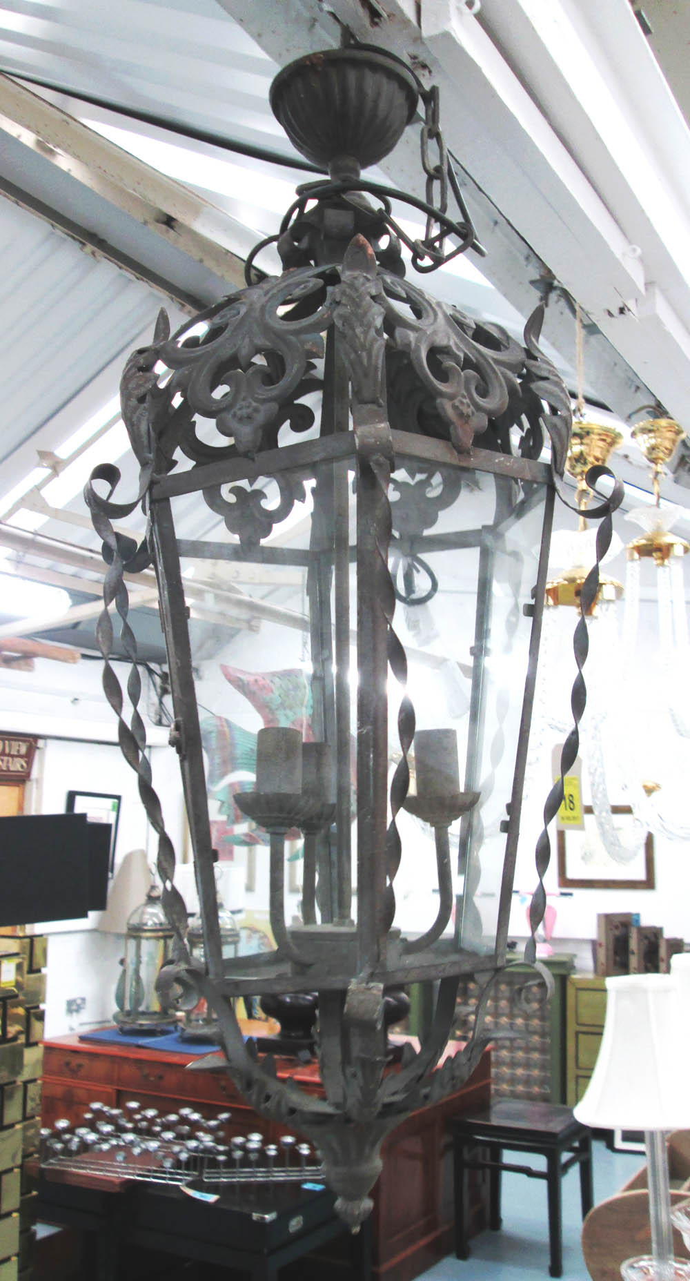 CHANDELIER, of large proportions, vintage style with ornate fretwork, 84cm H plus chain.