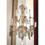 WALL SCONCES, a pair, gilt metal with glass droplets, of substantial proportions, 56cm W x 75cm H.