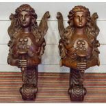 FIGUREHEAD CARVINGS, Renaissance style hardwood in the form of angels, each holding a torch,