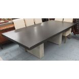 DINING TABLE, the black top on a industrial style concrete and metal base,