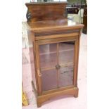 MUSIC CABINET, Edwardian mahogany with glazed door enclosing two shelves,