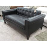 SOFA, two seater in black leather pocketed back on square supports, 166cm L.