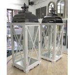 STORM LANTERNS, a pair, in a square wooden frame with metal tops, 90cm H.