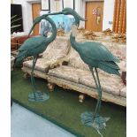 BRONZE MEIJI CRANES, a pair, in a verdigris finish, 144cm H.