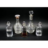 SPIRIT DECANTERS, a set of three, 19th century each with engraved name,