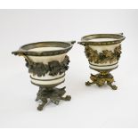 URNS, a pair, 19th century gilt bronze each with an acorn and oak leaf band,