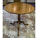 TRIPOD TABLE, George III mahogany with circular tilt top on wrythen turned column, 70cm H x 78cm D.