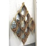 NIGHT LIGHT HOLDER, wall mounted Eastern style with mirrored back in ornate gilded metal,