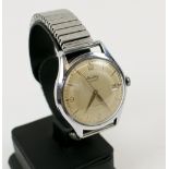 BREITLING UNIDATE AUTOMATIC WRISTWATCH, circa 1950's, champagne dial, stainless steel case.