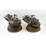 TRIBAL MASKS, an imposing companion pair, West African bronze with coiled Rafia head rests,