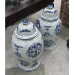 LIDDED JARS, a pair, Chinese style blue and white, 47cm H.