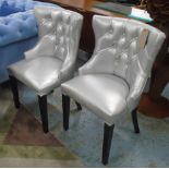 SILVER UPHOLSTERED CHAIRS, a pair, with buttoned backs, 51cm W x 95cm H.