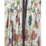 CURTAINS, a pair, jungle scene lined and interlined, each curtain 83cm W gathered x 218cm drop.