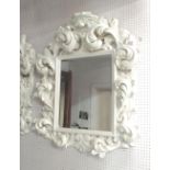 MIRROR, bevelled, in ornate Louis XV style white frame, 106cm x 91cm.