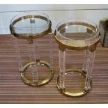 TRAY TABLES, a pair, circular with lucite tops on a brass effect and lucite base,