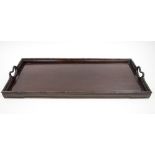 TRAY, early 20th century Chinese padoukwood with bamboo carved gallery and pierced handles,