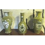 VASES, three, Chinese style with a green ground decorated with vase designs,