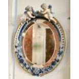 LOOKING GLASS, Meissen style ceramic with cherub mounted frame bevelled oval plate, 33cm H x 25.