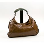 YVES ST. LAURENT HOBO BAG, brown leather with silvered coloured metal naturalistic handle, approx.