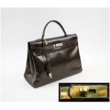 HERMES BROWN LEATHER KELLY BAG, gold tone fitments, padlock and keys, 35cm W x 25cm H.