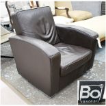 ARMCHAIR BY BOCONCEPT, in a burnt umber leather on polished metal feet, can retail at £1000,