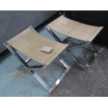 STOOLS, a pair, having leather snakeskin patterned strapwork seats on X-frame chromed frame,