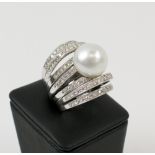 WHITE GOLD DRESS RING, set diamonds and a large South Sea pearl.