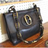 YVES ST LAURENT VINTAGE HANDBAG, black leather with gold tone fitments, approx. 27cm W x 19cm H.