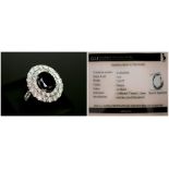 AN OVAL BLACK DIAMOND COCKTAIL RING, set in 18ct white gold. Matching previous lot.