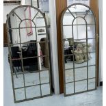 WALL MIRRORS, a pair, gothic arched window pane, distressed metal framed, 158cm H x 66cm W.