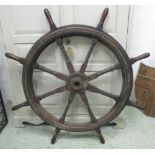 SHIPS WHEEL, teak with brass bindings, 140cm diam approx.