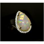 18K WHITE GOLD, DIAMOND AND OPAL CLUSTER RING, set tear drop shaped cabochon opal,