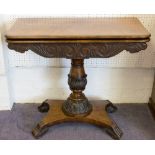 TEA TABLE, William IV mahogany circa 1830 with crossbanded foldover top on leaf carved pedestal,
