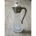 CLARET JUG, of tapering cut glass form with silver coloured metal cover and handle, 34cm H.