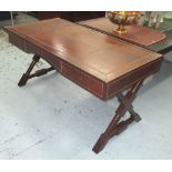 DESK, in brown stitched leather with three drawers, on X-frame wooden supports,