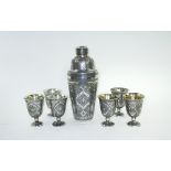 PERSIAN DRINKING SET, comprising of a cocktail shaker, 24cms H & six matching goblets, 9cm H,