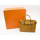 HERMES BIRKIN HANDBAG, saffron ostrich, with padlock, keys, gold tone fitments, 30cm W x 22cm H,