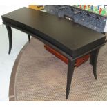 DESK, Contemporary, of arched form in an ebonised finish,with one draw,