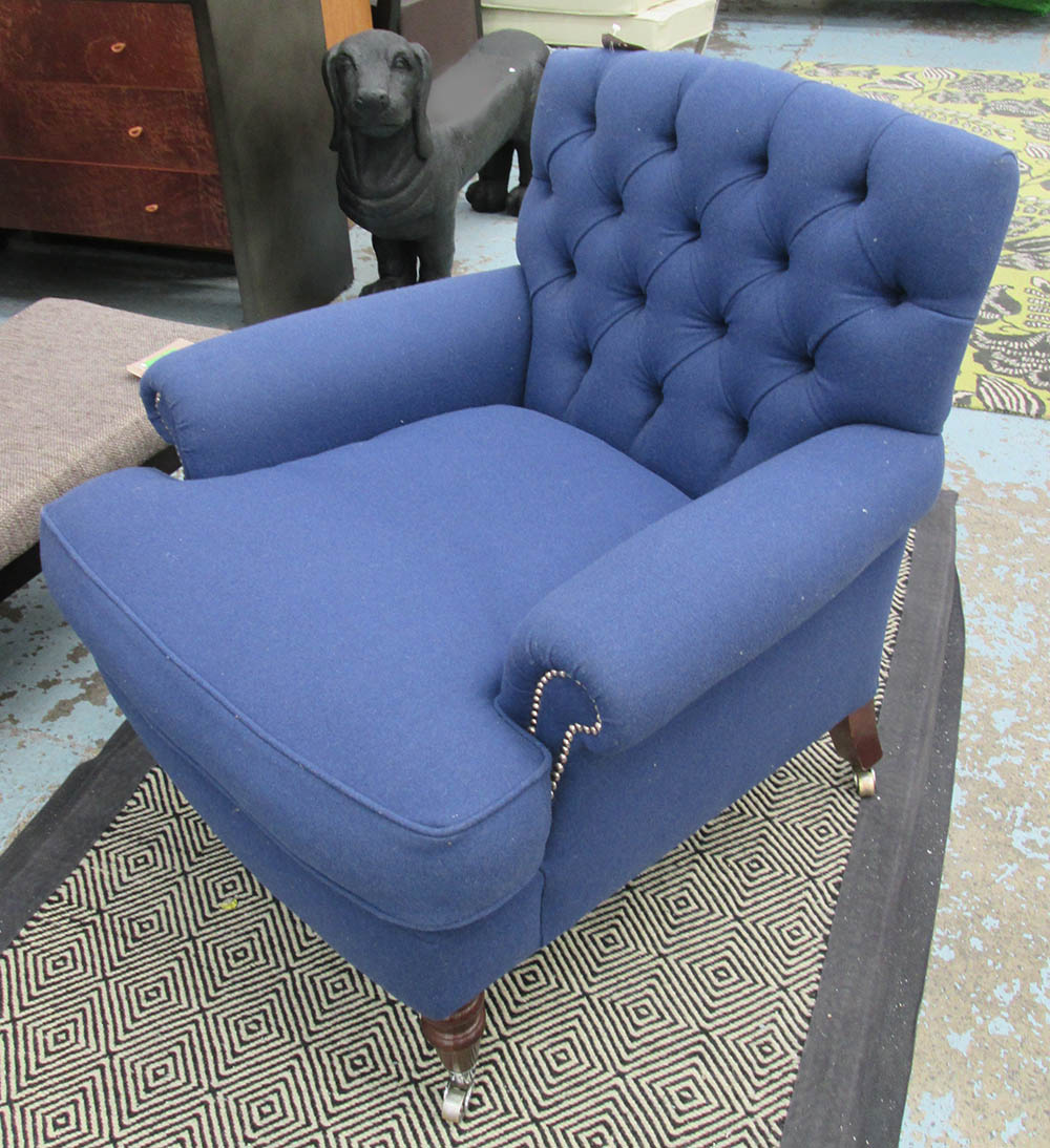 ARMCHAIR, in blue buttoned felt from I and J.L Brown Kings Road, 89cm W x 88cm H x 80cm D.