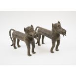 LOBI BRONZE PANTHER SCULPTURES, two similar, Burkina Faso, with concentric circle cast detail;.