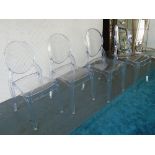 CHAIRS, a set of four, in clear perspex with oval backs, 41cm W.