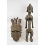 TRIBAL ARTS, Bamana woman, 79cm H and an ancestor face mask, 55cm H, both carved wood.