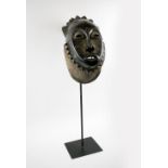 BAULE PEOPLE FACE MASK, painted and carved wood, 47cm H x 23cm W, plus stand.