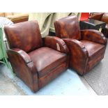 ARMCHAIRS, a pair, in tanned leather Art Deco style on block supports.